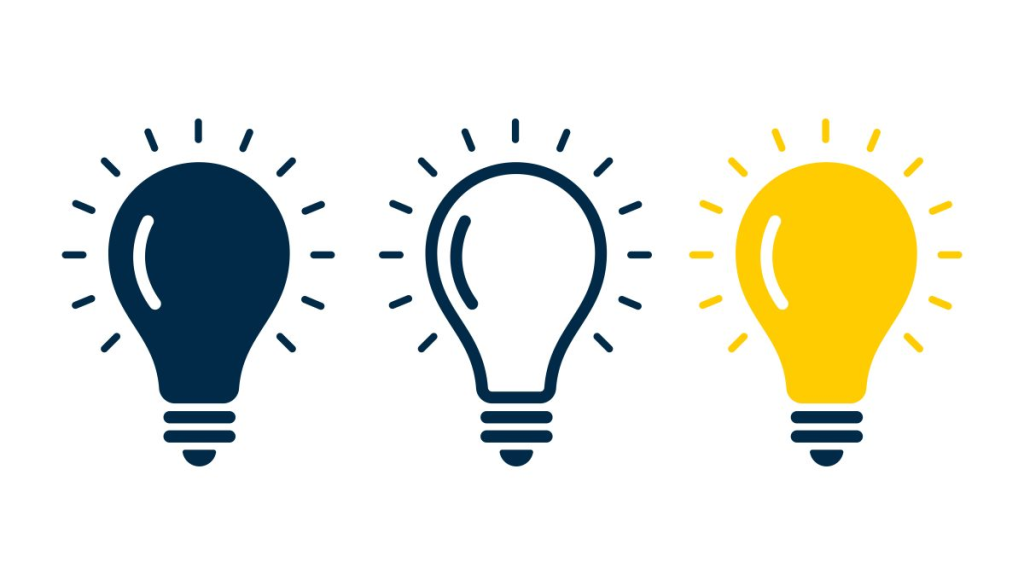Uma representação visual de ideias com três lâmpadas de diferentes cores, transmitindo conceitos de inspiração, criatividade e inovação.