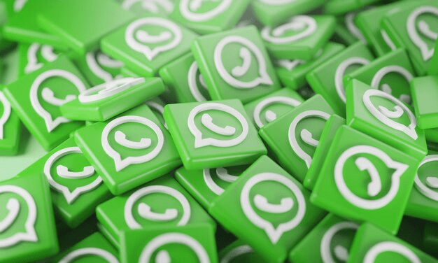 Múltiplos ícones do WhatsApp espalhados simbolizam a ampla rede de comunicação e o alcance global do aplicativo.

