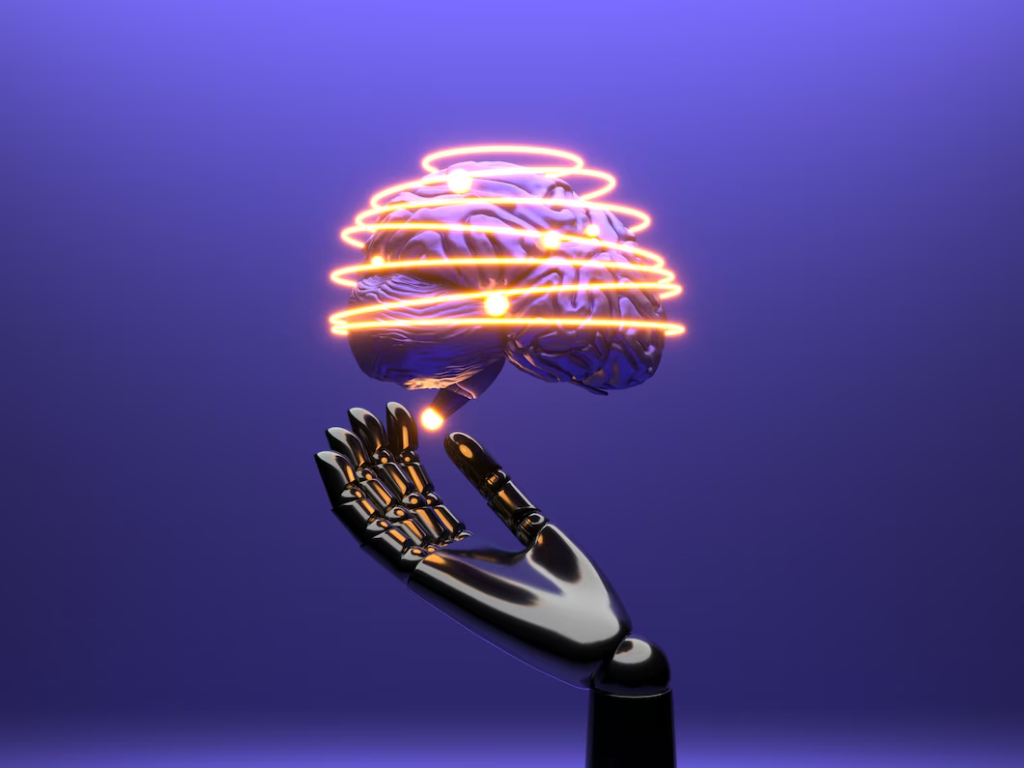 Um cérebro mecânico iluminado por circuitos laranja sendo segurado por uma mão robótica, simbolizando a fusão da inteligência artificial com a cognição humana, em um fundo azul uniforme.